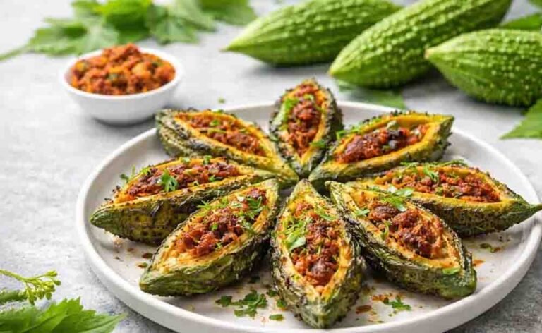 गर्मियों में सेहत का सुपरफूड है भरवां करेला और इस खट्टी मीठी रेसिपी से कड़वाहट होगी पूरी तरह खत्म